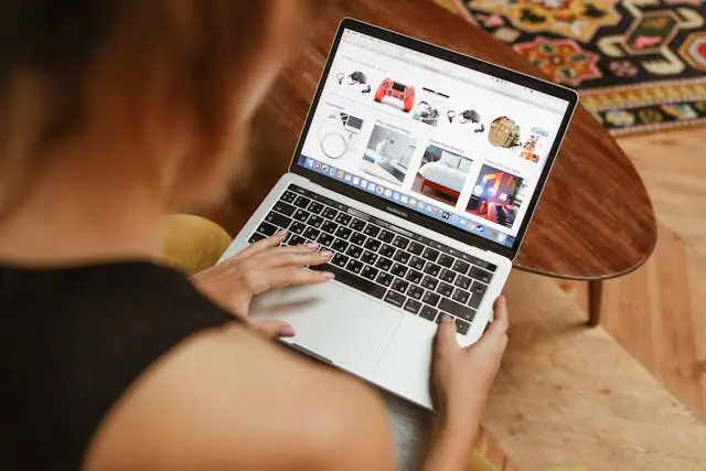 Person browsing an e-commerce store on a laptop